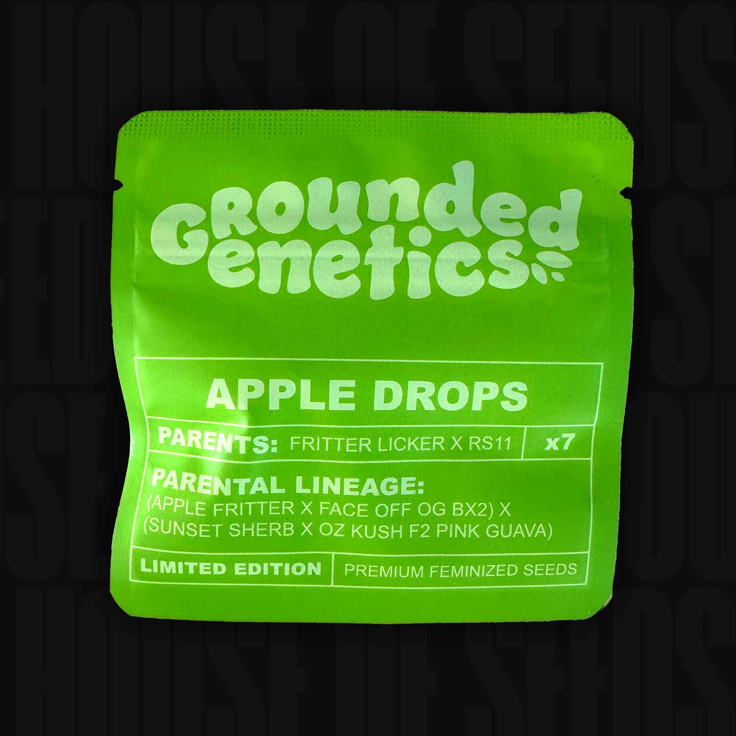 Leuchtend grüne Grounded Genetics Verpackung für Apple Drops mit Kreuzung Fritter Licker x RS11 und Hinweis auf limitierte Auflage